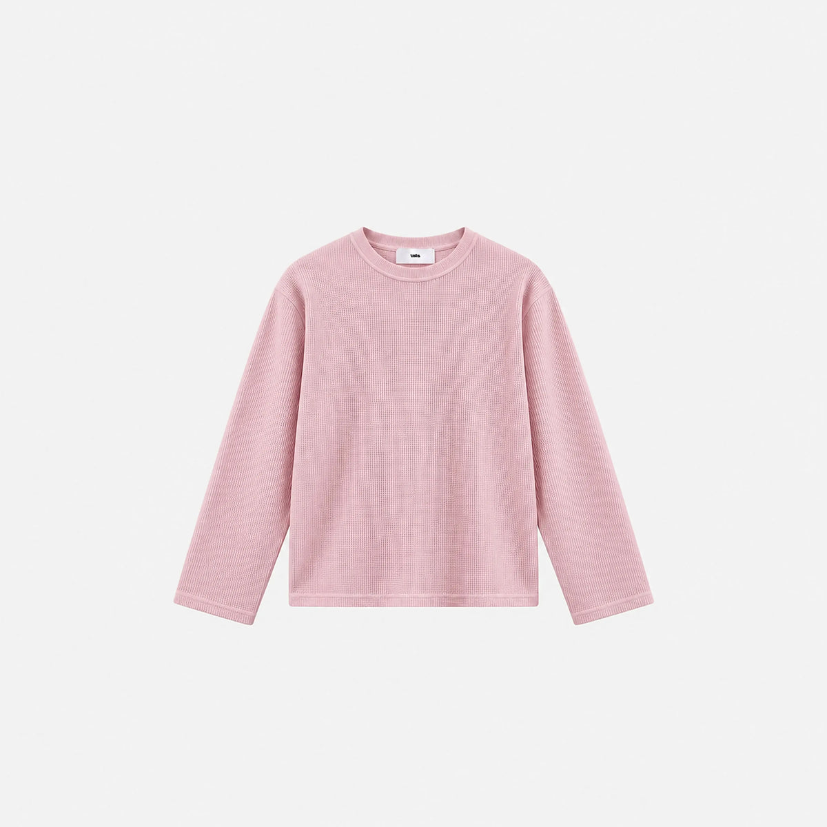 Front view of the BASICSS Pink Script Waffle Longsleeve, featuring a crew neck, relaxed long sleeves and textured fabric, displayed against a light background.