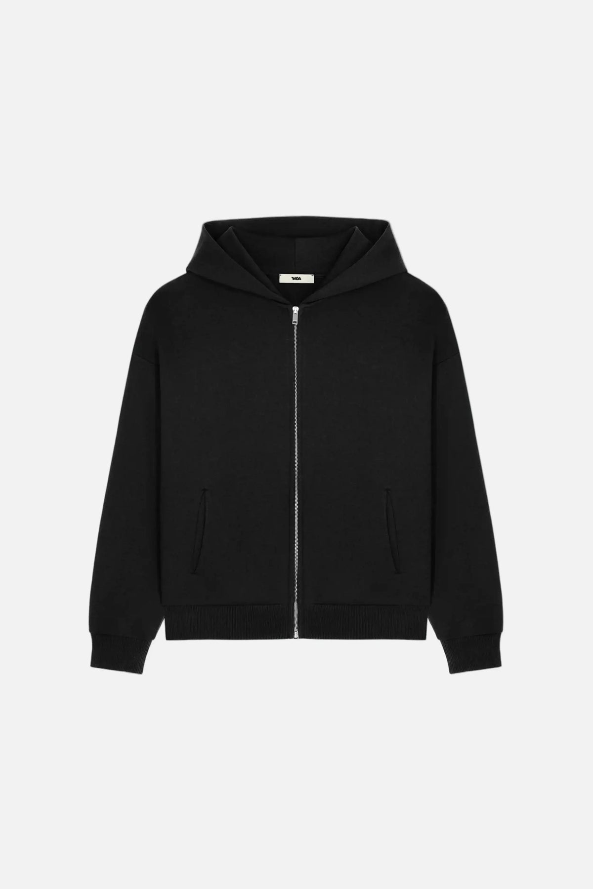 BASICSS Black Cloud Zip-Up Hoodie, featuring an oversized boxy fit, heavyweight cotton fabric, full-length silver zip, double-layered hood, ribbed cuffs and waistband, shown against a light grey background.
